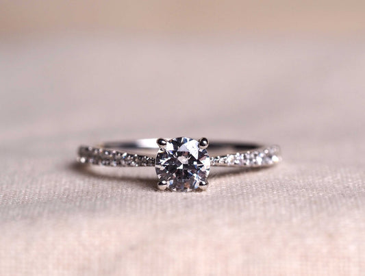 18ct White Gold 0.60ct Solitaire With Diamond Band